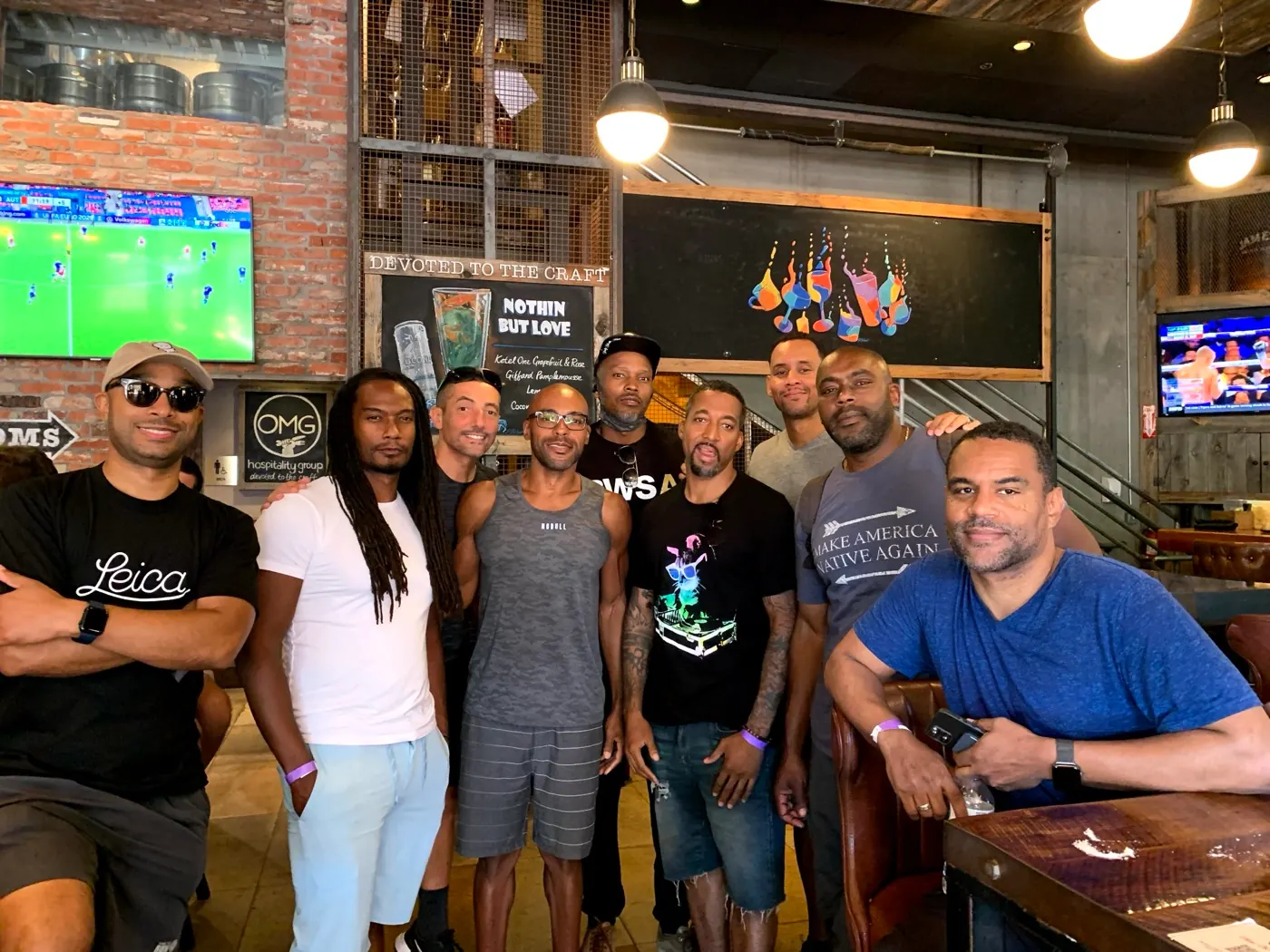Men standing together after a Brotherhood gathering, representing the practice of True Manhood.