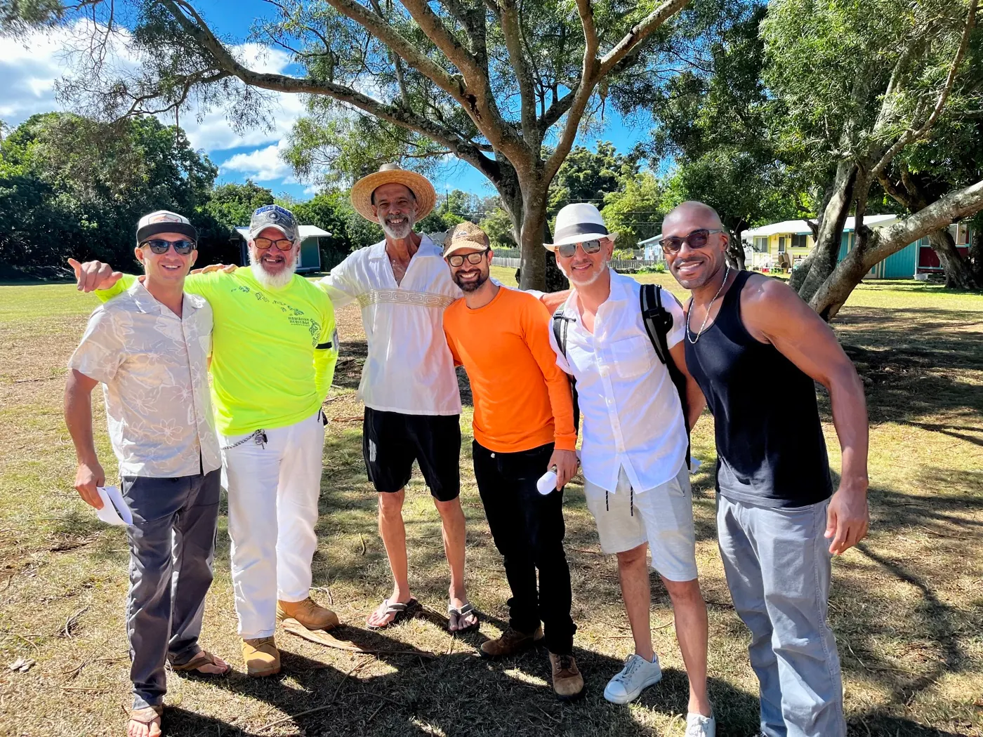 Men standing together outdoors, representing the healing power of real Brotherhood.
